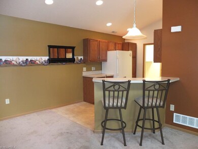 Kitchen is open to the dining room.