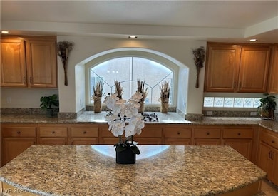 Kitchen featuring healthy amount of natural light,