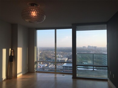 Unfurnished room with floor to ceiling windows, w