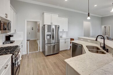 Kitchen has all stainless steel appliances