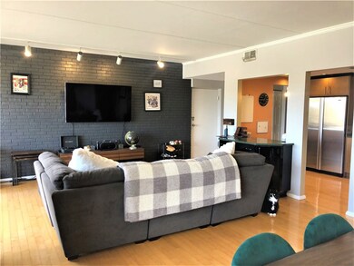 Living room with brick wall