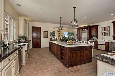 This is a chef's kitchen with multiple work areas 