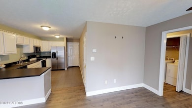 Ren1.410-LivingToKitchen