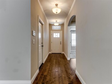 Entryway featuring dark hardwood / wood-style floo
