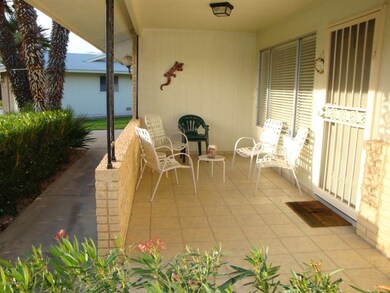 WALKWAY AND TILED FRONT PATIO