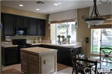 Kitchen opens to family room for entertaining gues