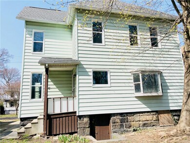 REAR VIEW OF THE HOUSE, FACING NORTH.