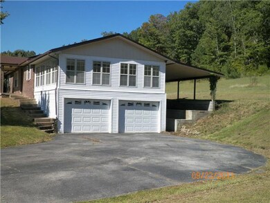 SIDE VIEW WITH 2 CAR GARAGE IN BASEMENT
