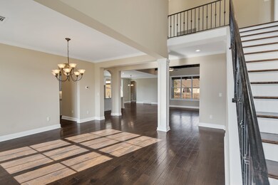 Interior space with ornamental molding, a chandeli