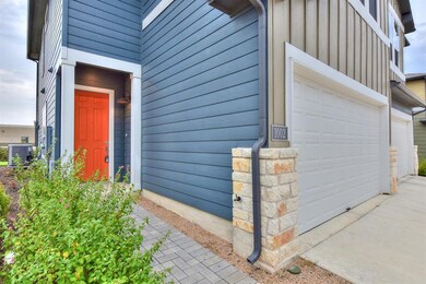 Property entrance featuring board and batten sidi