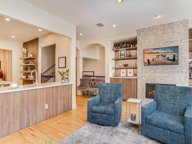 Sitting room with a tile fireplace, wood finished