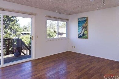 Dining area adjacent to living room and kitchen.