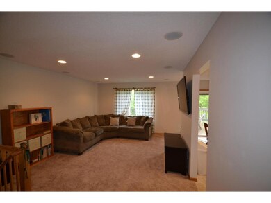 Open living room with window over looking the back