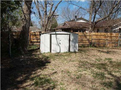Nice storage building for your lawn equipment.