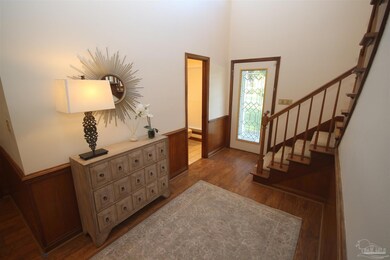 the great room. 1/2 bath through door to the left.