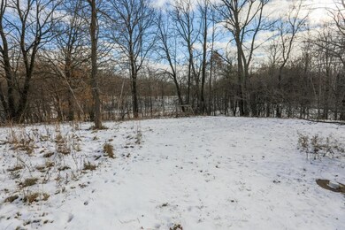 Wooded acreage, pond area