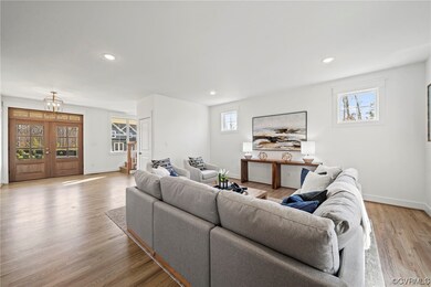 Living room featuring light wood-type flooring and