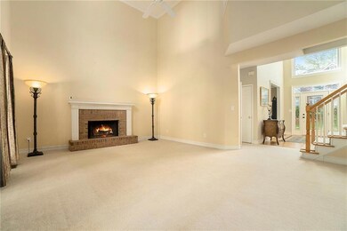 Unfurnished living room featuring carpet flooring,