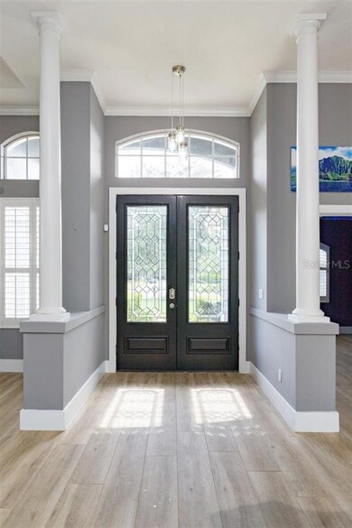 Enter through the double doors and appreciate the 
