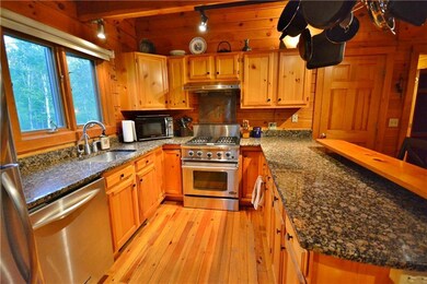 Closer view of the kitchen. Very nice!