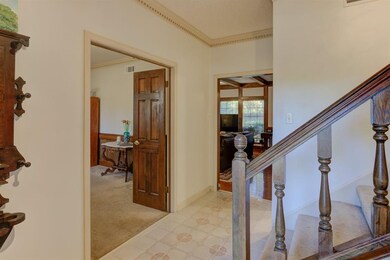 Living room on left, Den in Middle and Dining Room