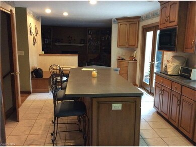 Massive eat in kitchen with quick access to the im