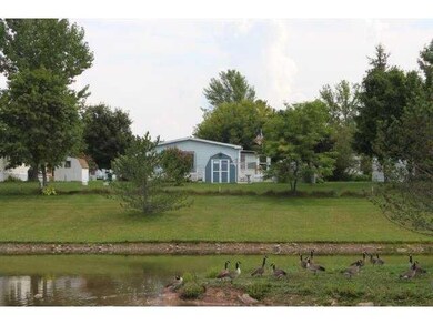 Exterior Back This house backs up to the Pond and 