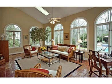 Vaulted Ceiling with two skylights provide for an 