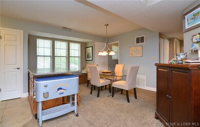Open kitchen and dining area (table w/4 chairs inc