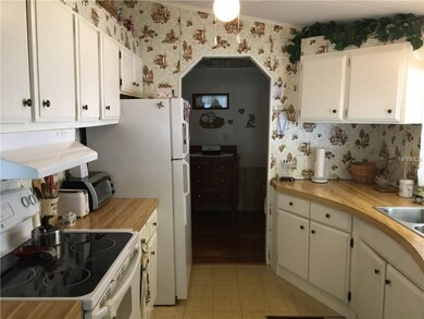 Galley Kitchen off Dining Area.  All appliances in