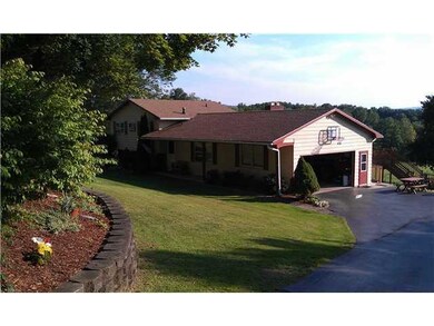 Exterior Front 2 car garage w/storage loft