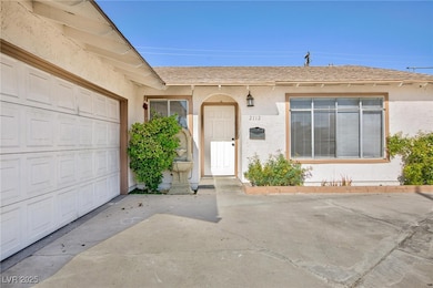 View of exterior entry featuring stucco siding, a
