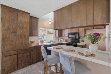 Kitchen w plenty of cabinets/storage.
