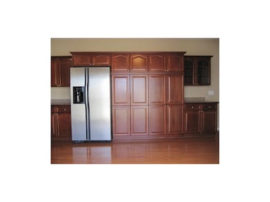 An entire kitchen wall dedicated to storage.  Stai