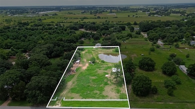 This photo showcases a spacious rural property out