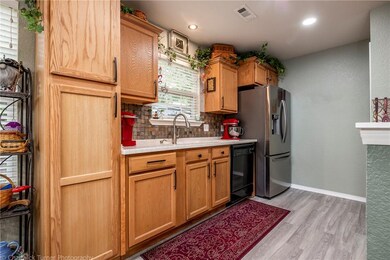 New granite tech kitchen countertops and storage cabinet