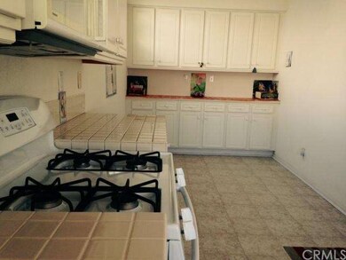 Kitchen has seating area and lots of cabinet space