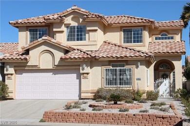 Mediterranean / spanish-style home featuring concr