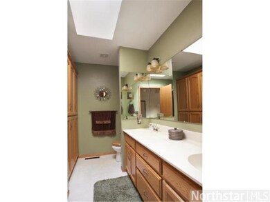 This upper level full bath gets natural lighting f