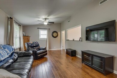 Living room with handscraped wood flooring!