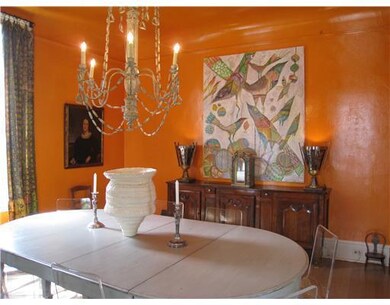Dining Room. Dramatically painted, high cove ceili