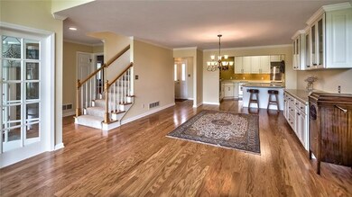 View from living room thru dining room to kitchen,