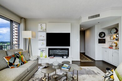 The living area features a contemporary, custom bu