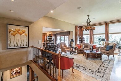 Large Light filled main floor family room w/high c