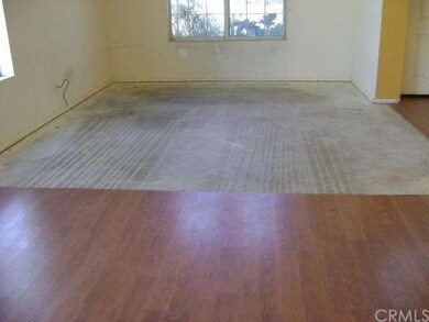 View from dining area to living area, entry to the