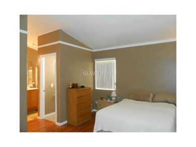 Property Photo. Master bedroom has vaulted ceiling