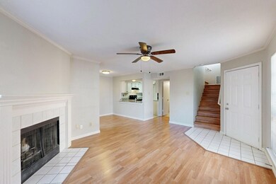 Unfurnished living room featuring a fireplace, cei