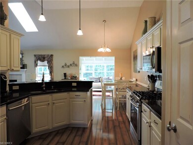 Eat in Kitchen also features vaulted ceilings, gra