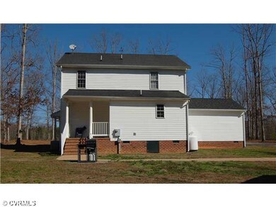 Exterior Back - Rear view of home with patio.