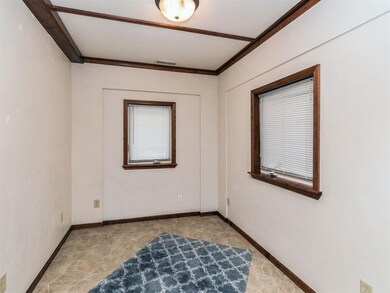 Den/studay/mudroom from garage leading to family r